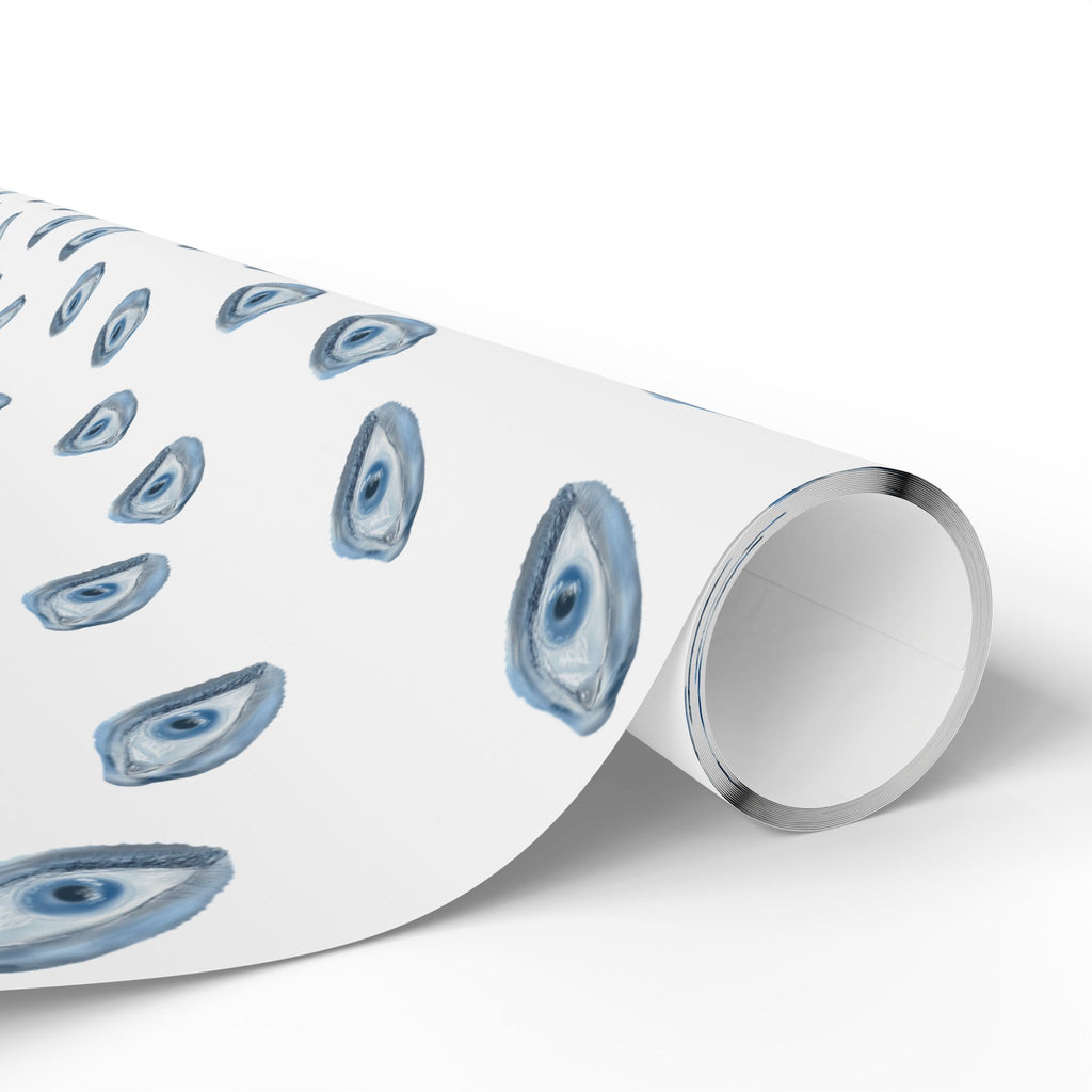 Roll of white paper with blue eye pattern on a white background